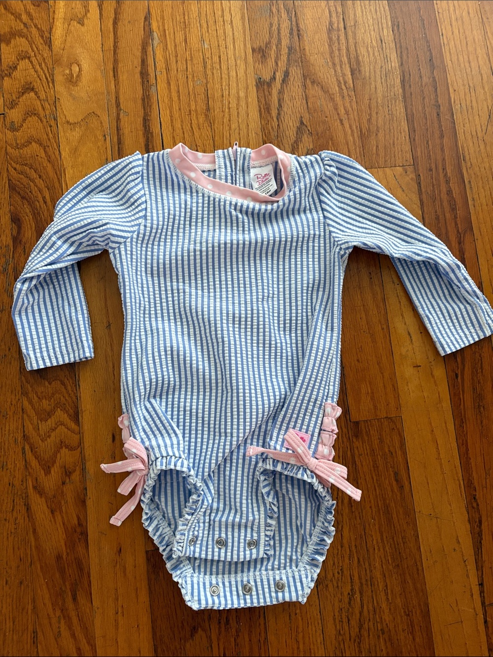 Ruffle Butts Blue and White Striped Romper with Pink Polka Dot Trim